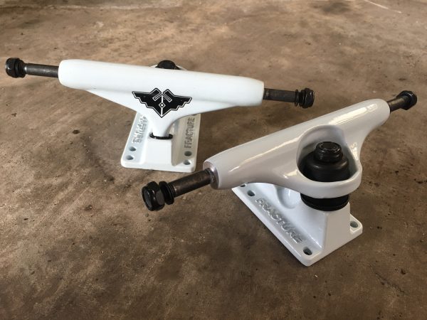 White fracture skateboard trucks